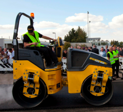 Designed with comfort and productivity in mind, the new BOMAG BW138AD-5 tandem vibratory roller features dual travel levers, a foldable ROPS, and larger drum diameter for enhanced asphalt compaction performance.