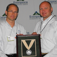 Paul (L) and Steve Kuhlman accept the Evergreen Marketing Group's Distributor of the Year Tier 1 award on behalf of their company, Acme Tools of Grand Forks, ND Paul (L) and Steve Kuhlman accept the Evergreen Marketing Group's Distributor of the Year Tier 1 award on behalf of their company, Acme Tools of Grand Forks, ND