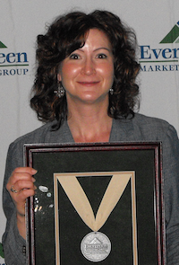 Tina Erpenbach takes home the Evergreen Marketing Group's Tier 2 Distributor of the Year award for her company, Northern States Supply of Willmar, MN Tina Erpenbach takes home the Evergreen Marketing Group's Tier 2 Distributor of the Year award for her company, Northern States Supply of Willmar, MN